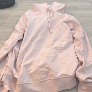 Lulu lemon large sweatshirt. Color is a cream pink. Worn twice.